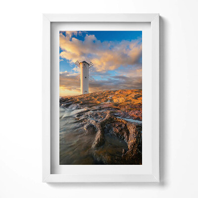 Keretezett kép Tengerparti világítótorony naplementében