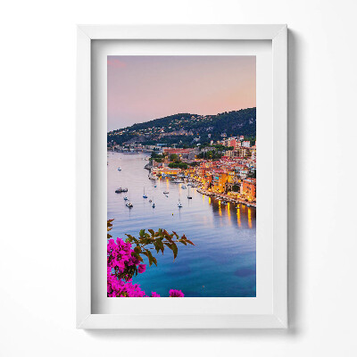 Keretezett kép Tengerparti városkép naplementében