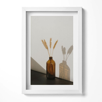 Keretezett kép Barna üveg vázában búzavirágok