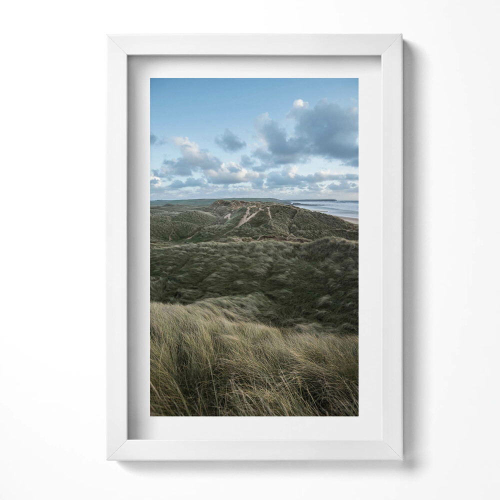 Keretezett kép Tengerparti dűnék és felhős ég