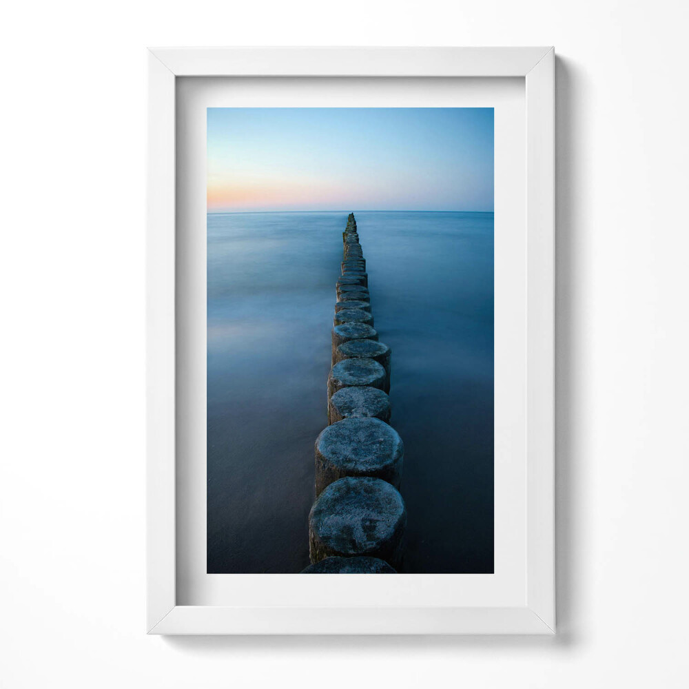 Keretezett kép Tengerparti stég naplementében