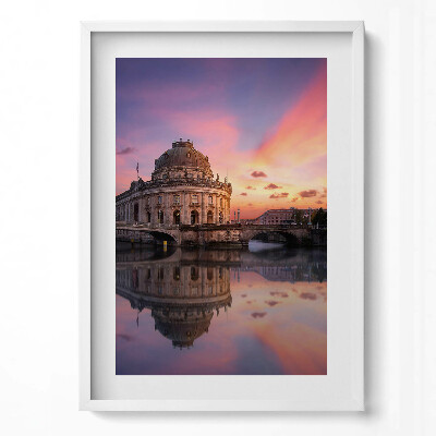 Függőleges kép keretben Színes naplemente vízparti épület