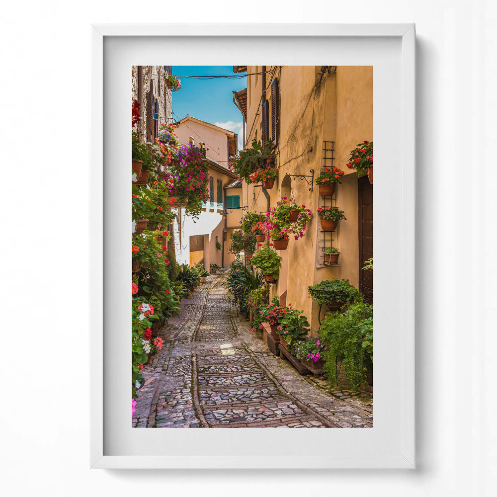 Függőleges kép keretben Virágos utcácska festmény