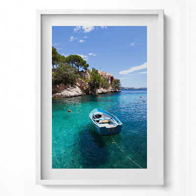 Függőleges kép keretben Tiszta víz csónak sziklás part