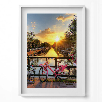 Függőleges kép keretben Naplemente és rózsaszín kerékpár