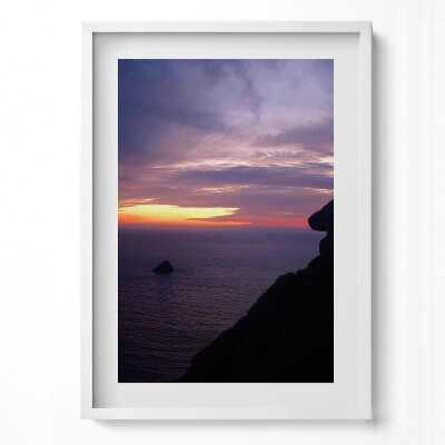 Függőleges kép keretben Naplemente a tenger felett