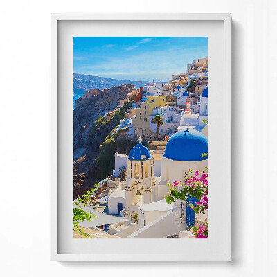 Függőleges kép keretben Fehér házak kék kupolák tengerparti táj
