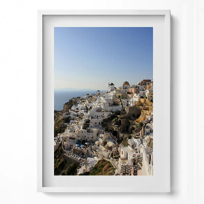 Függőleges kép keretben Fehér házak tengerparti dombon