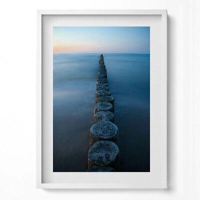 Függőleges kép keretben Tengerparti stég naplementében