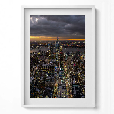 Függőleges kép keretben Városi táj éjszaka fényekkel