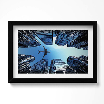 Keretezett kép Repülőgép épületek felett