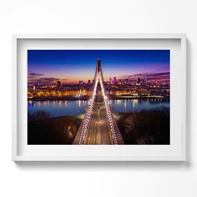 Kép keretben Híd városi tájjal és naplementével