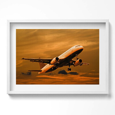 Kép keretben Repülőgép felszállása naplementében