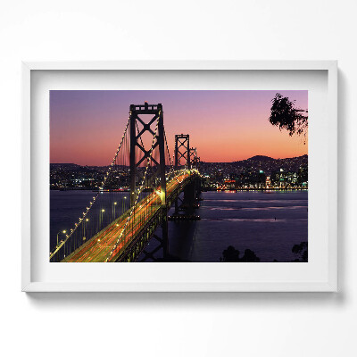 Kép keretben Híd városnézettel naplementében