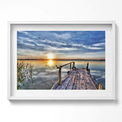 Kép keretben Naplemente vízparti hídon