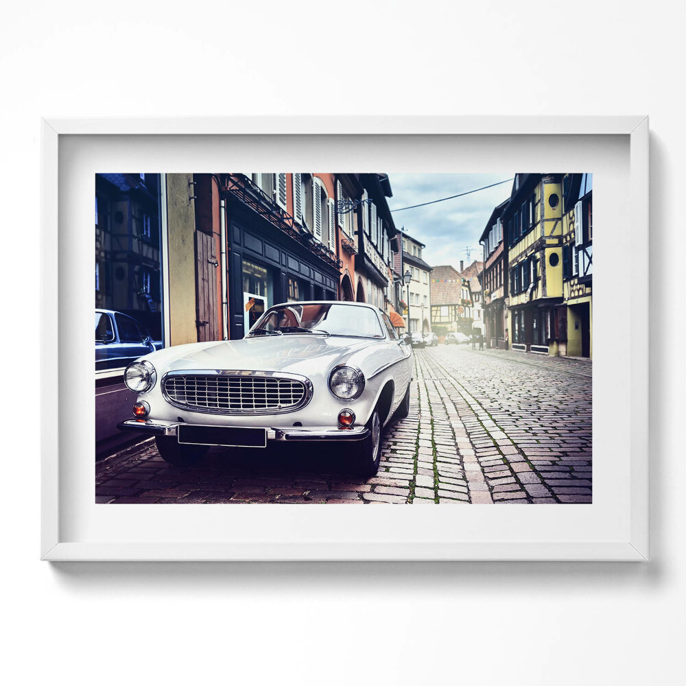Kép keretben Fehér klasszikus autó városi utca