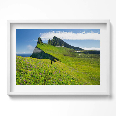 Kép keretben Zöld dombok hegyek felhők