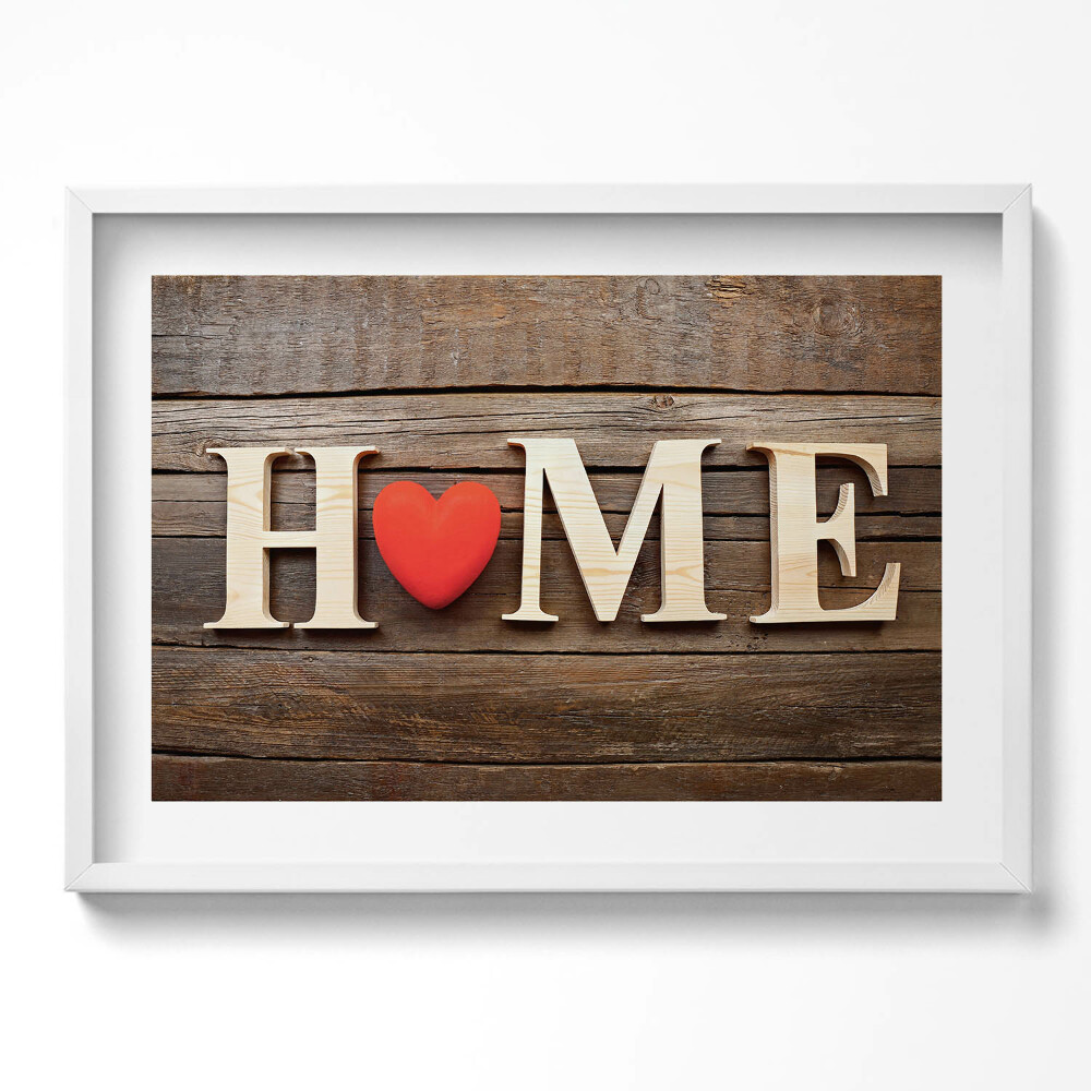 Kép keretben "HOME" felirat piros szívvel