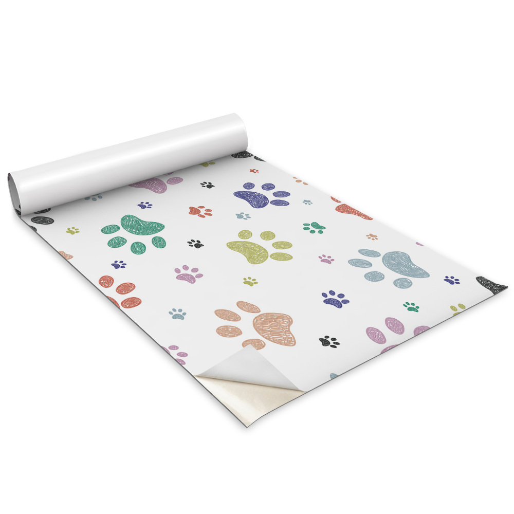 Dekoratív bútor matrica Aranyos színes kutyamancsok