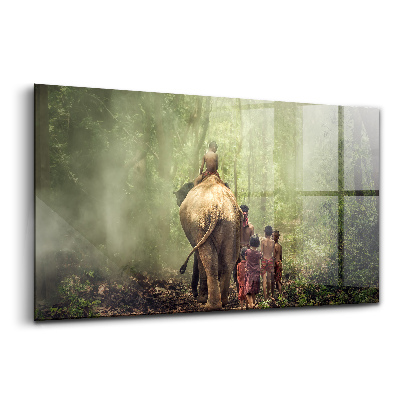 Üvegkép Gyerekek vezetnek egy elefántot
