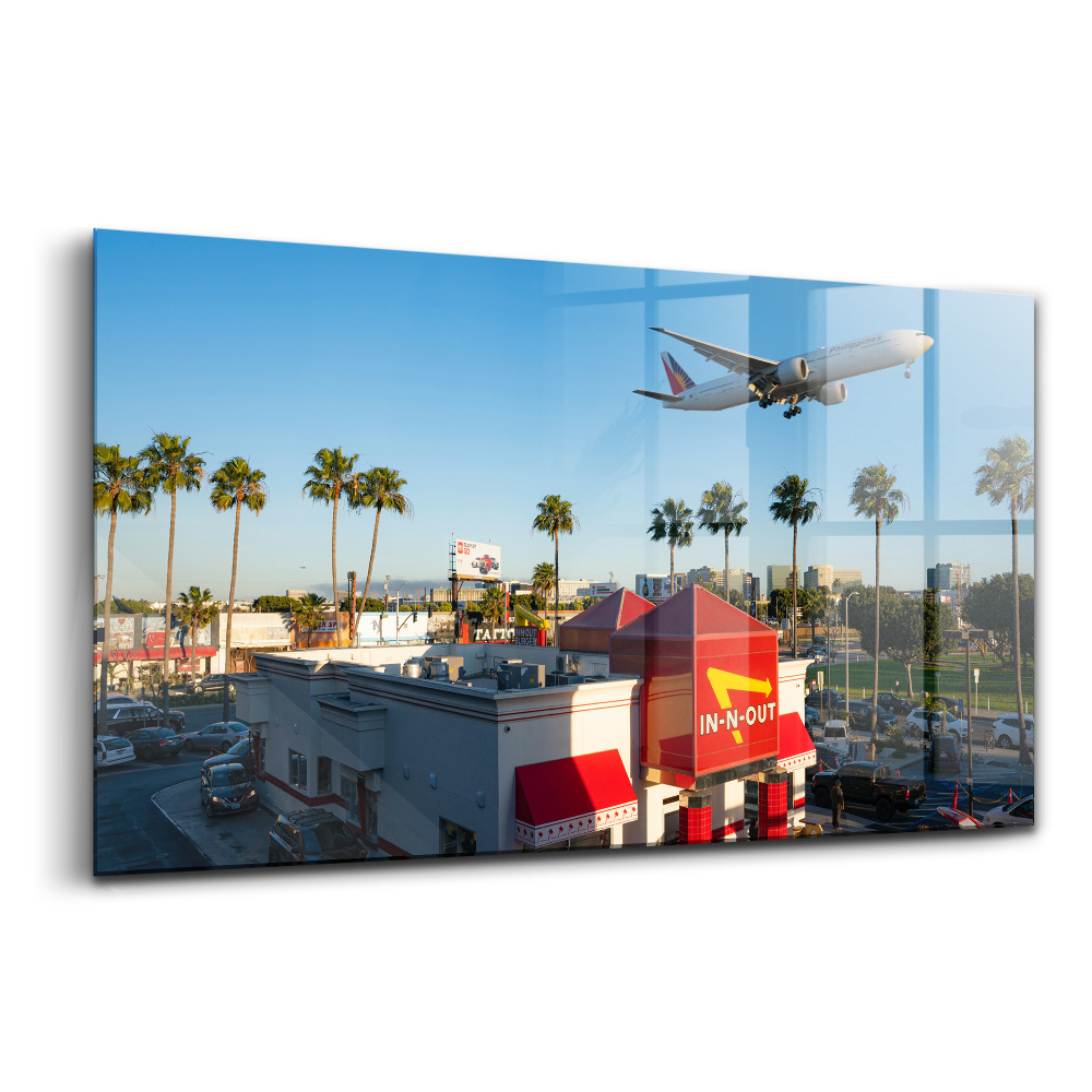 Üvegkép falra Felszálló repülőgép Los Angeles felett