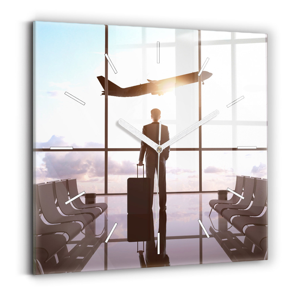 Szögletes üvegóra Férfi a repülőtéren